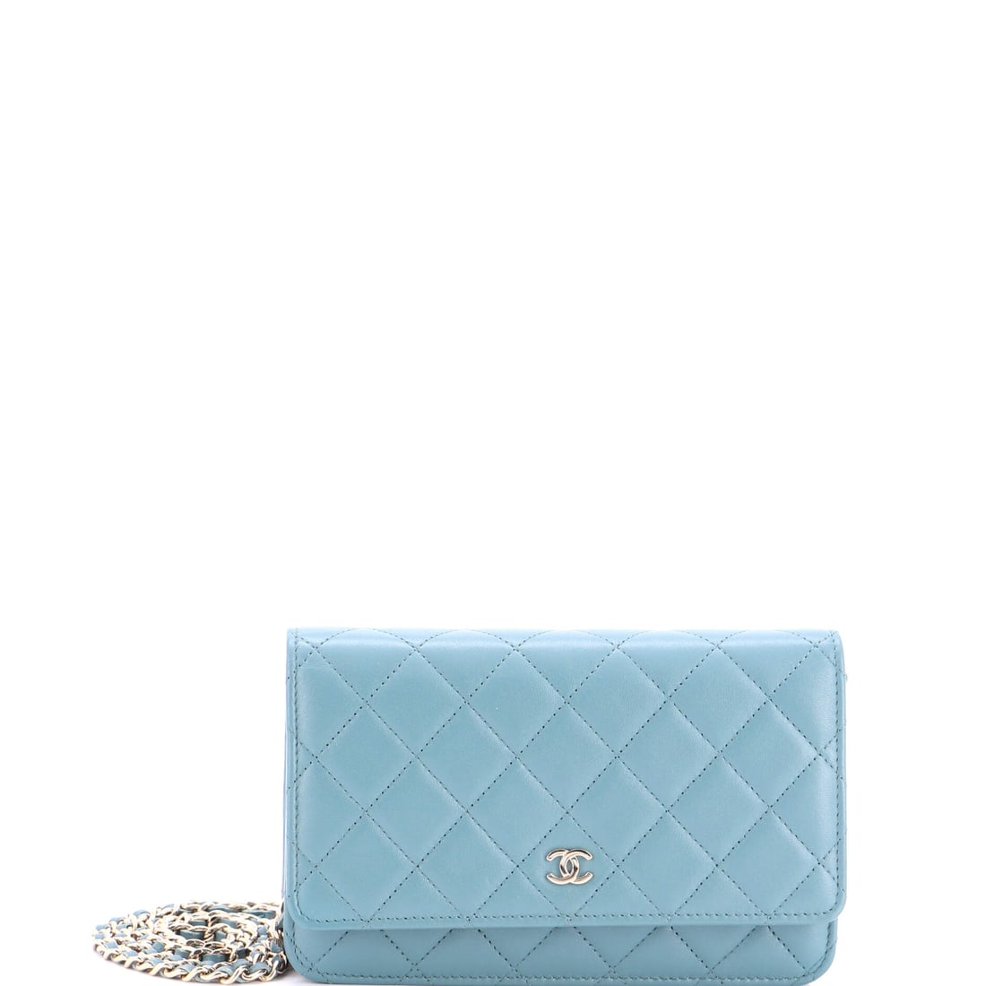 Chanel Wallet on Chain Quilted Lambskin Blue: The Chanel Wallet on Chain in blue quilted lambskin leather. Lambskin gives the piece a soft, supple hand characteristic of the house's quilting. Offered with the confidence of Maison de Beaubigonne's