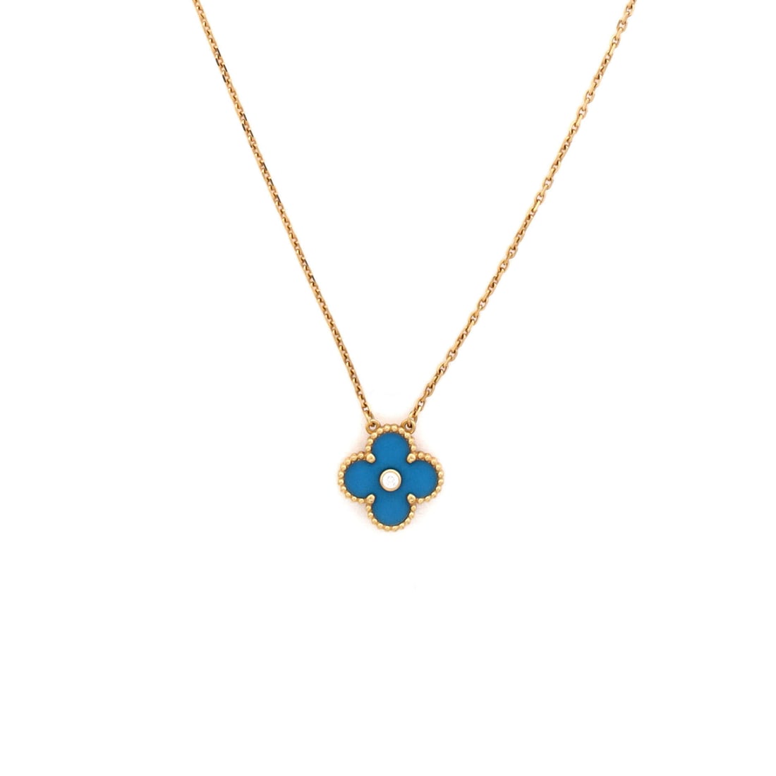 Van Cleef & Arpels Vintage Alhambra Pendant Necklace 18K Yellow Gold and Blue Sevres Porcelain with: Van Cleef & Arpels's Vintage Alhambra Pendant Necklace and Sevres Porcelain, crafted in 18K Yellow Gold. The Vintage Alhambra line carries clear house identity and ready bidder recognition. Worked ent