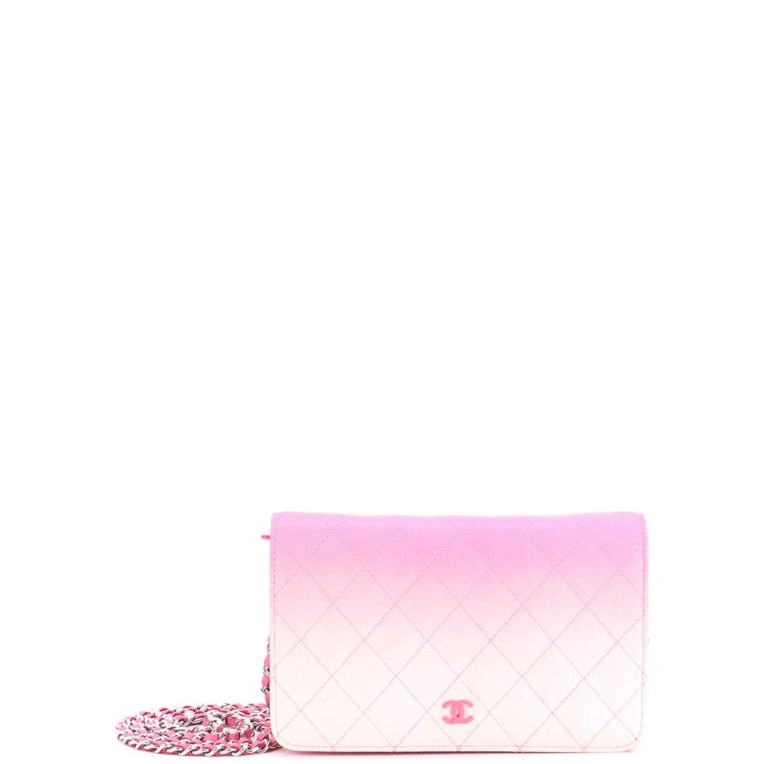Chanel Wallet on Chain Quilted Ombre Lambskin Pink: Chanel's Wallet on Chain Ombre in pink quilted lambskin leather. Lambskin gives the piece a soft, supple hand characteristic of the house's quilting. Scale runs to about 5 x 7.5 x 1.5 inches. A small-