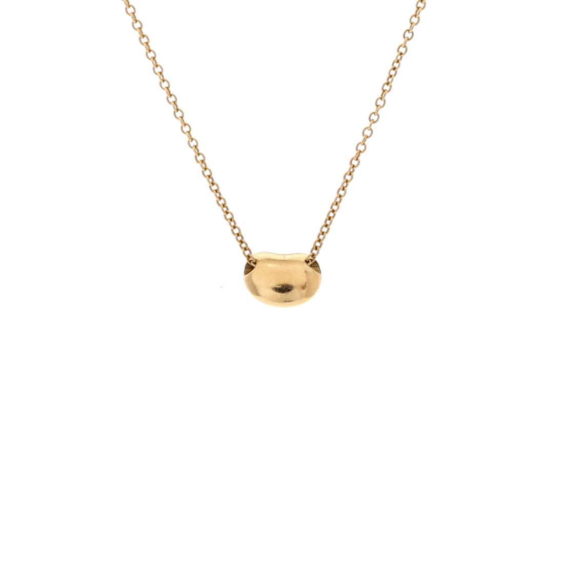 Tiffany & Co. Elsa Peretti Bean Pendant Necklace 18K Yellow Gold 7mm Yellow Gold: Tiffany & Co. Elsa Peretti Bean Pendant Necklace, worked in 18K Yellow Gold. The 18K Yellow Gold construction gives the design weight and a polished finish. Authenticity is assured through Maison de B