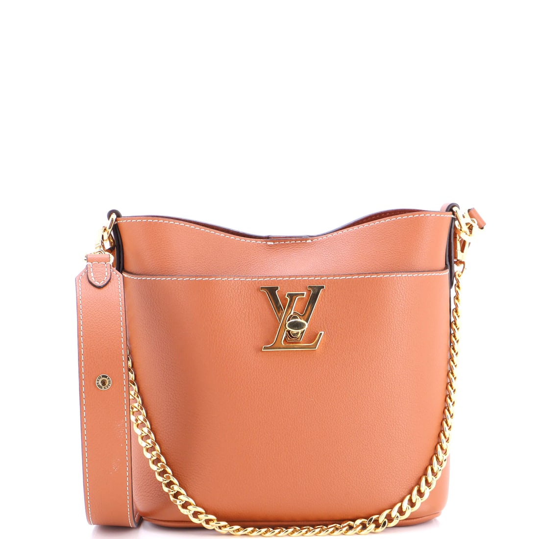 Louis Vuitton Lock and Walk Bucket Bag Leather Brown: A Louis Vuitton Lock and Walk Bucket Bag in brown leather. The piece measures roughly 8 x 8 x 5 inches. Its proportions and house identity make it an approachable lot for both seasoned collectors and 