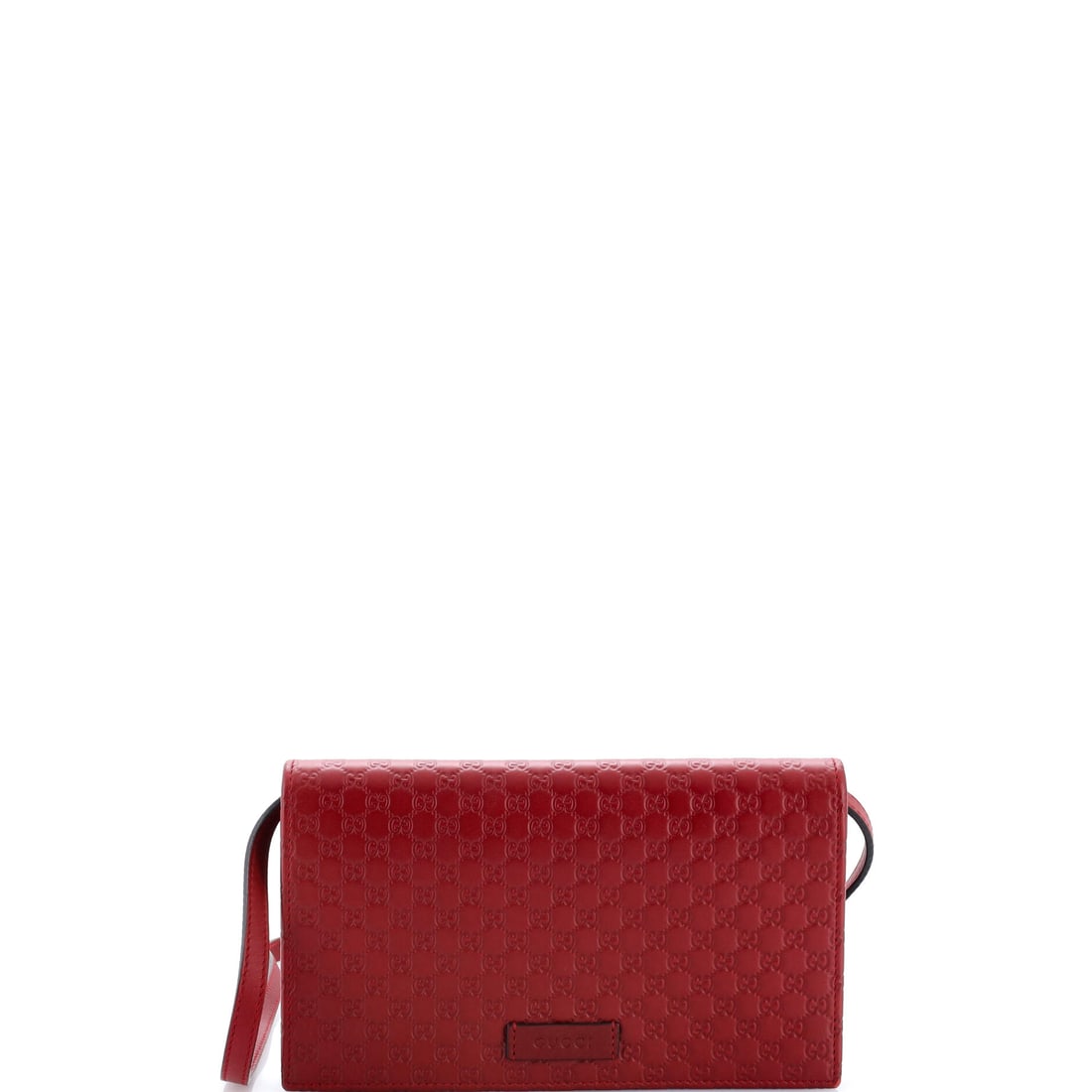 Gucci Wallet on Strap Microguccissima Leather Burgundy: A Gucci Wallet on Strap Microguccissima in burgundy leather. Approximate dimensions are 4 x 8 x 1 inches. Compact and functional, it suits collectors building out a brand's accessory line as much as d