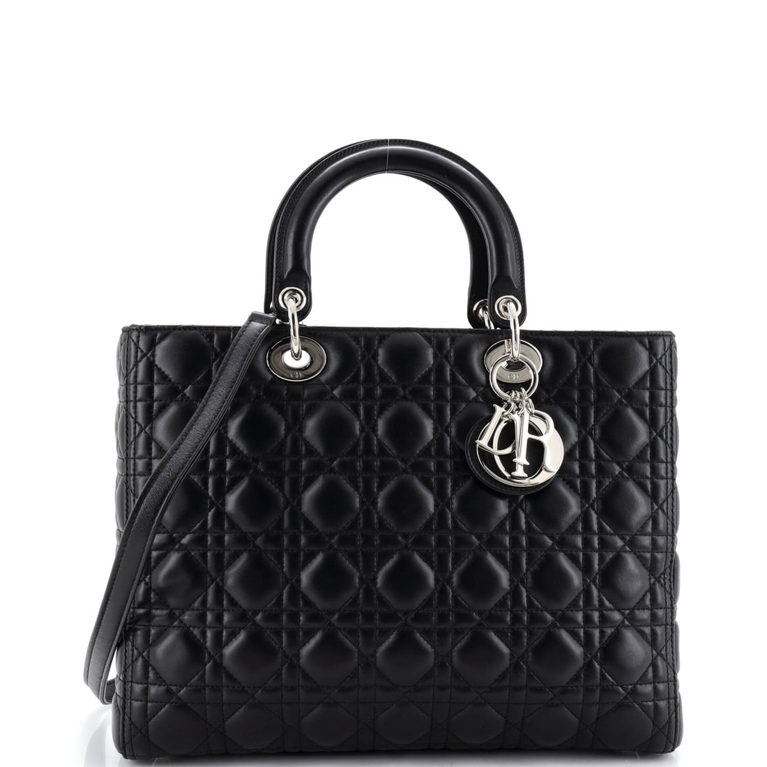 Christian Dior Vintage Lady Dior Bag Cannage Quilt Lambskin Large Black: Christian Dior Vintage Lady Dior Bag Cannage Quilt in black lambskin leather. Lambskin gives the piece a soft, supple hand characteristic of the house's quilting. Offered with the confidence of Maison