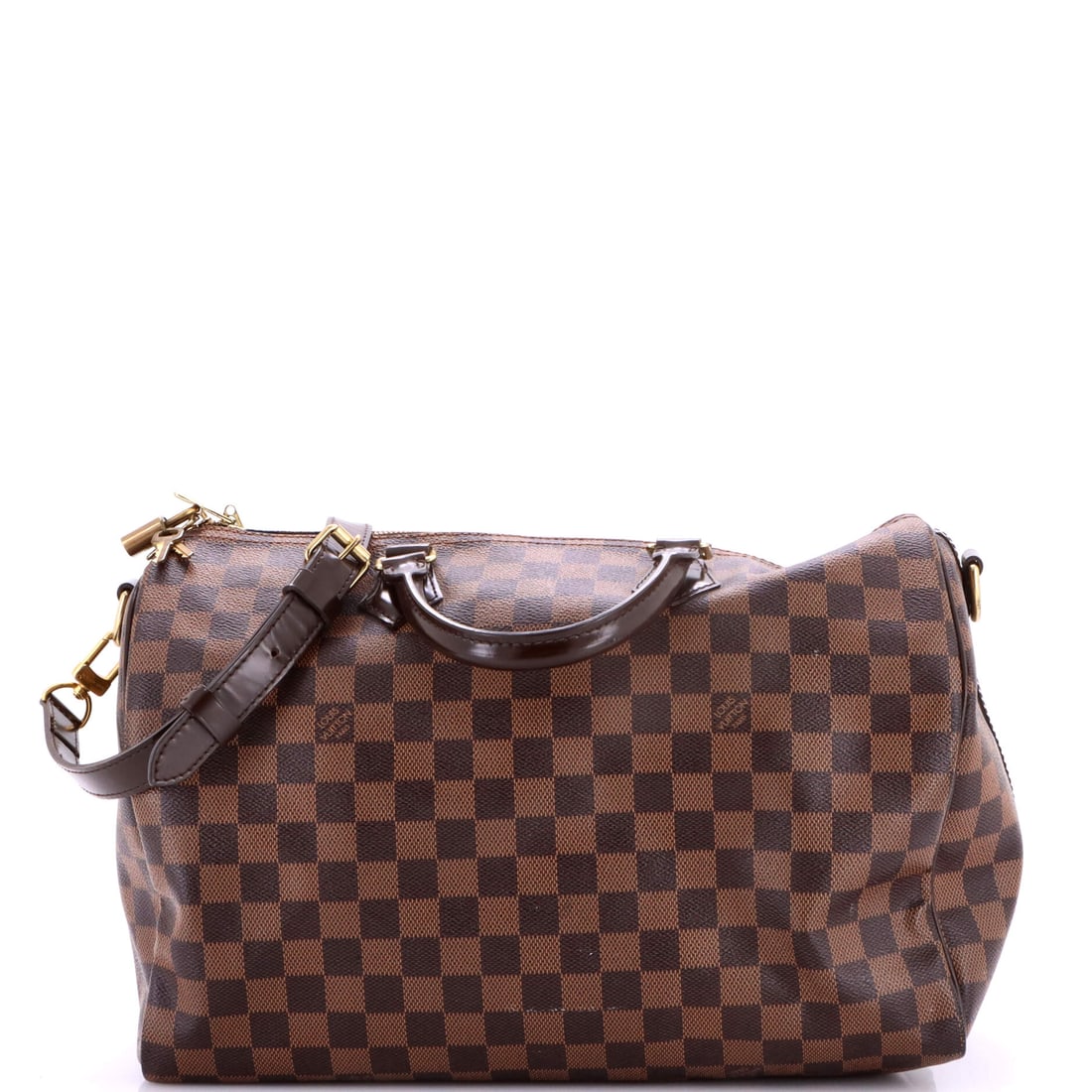 Louis Vuitton Speedy Bandouliere Bag Damier 35 Brown: Louis Vuitton's Speedy Bandouliere Bag in brown Damier canvas. The Damier check is one of Louis Vuitton's enduring house patterns. Offered with the confidence of Maison de Beaubigonne's authenticity g
