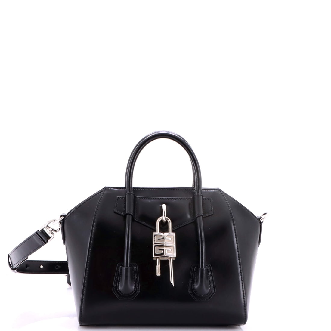 Givenchy Antigona Lock Bag Leather Mini Black: Givenchy Antigona Lock Bag in black leather. Offered in the Mini size. The piece measures roughly 7.5 x 8.5 x 5 inches. Its proportions and house identity make it an approachable lot for both seasoned