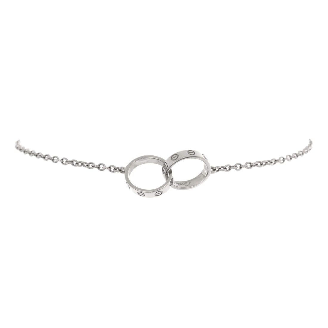Cartier Love Interlocking Bracelet 18K White Gold: In 18K white gold, the Love bracelet carries Cartier's codes plainly. The white gold finish lends a consistent color across the form. Reviewed for authenticity and offered with Maison de