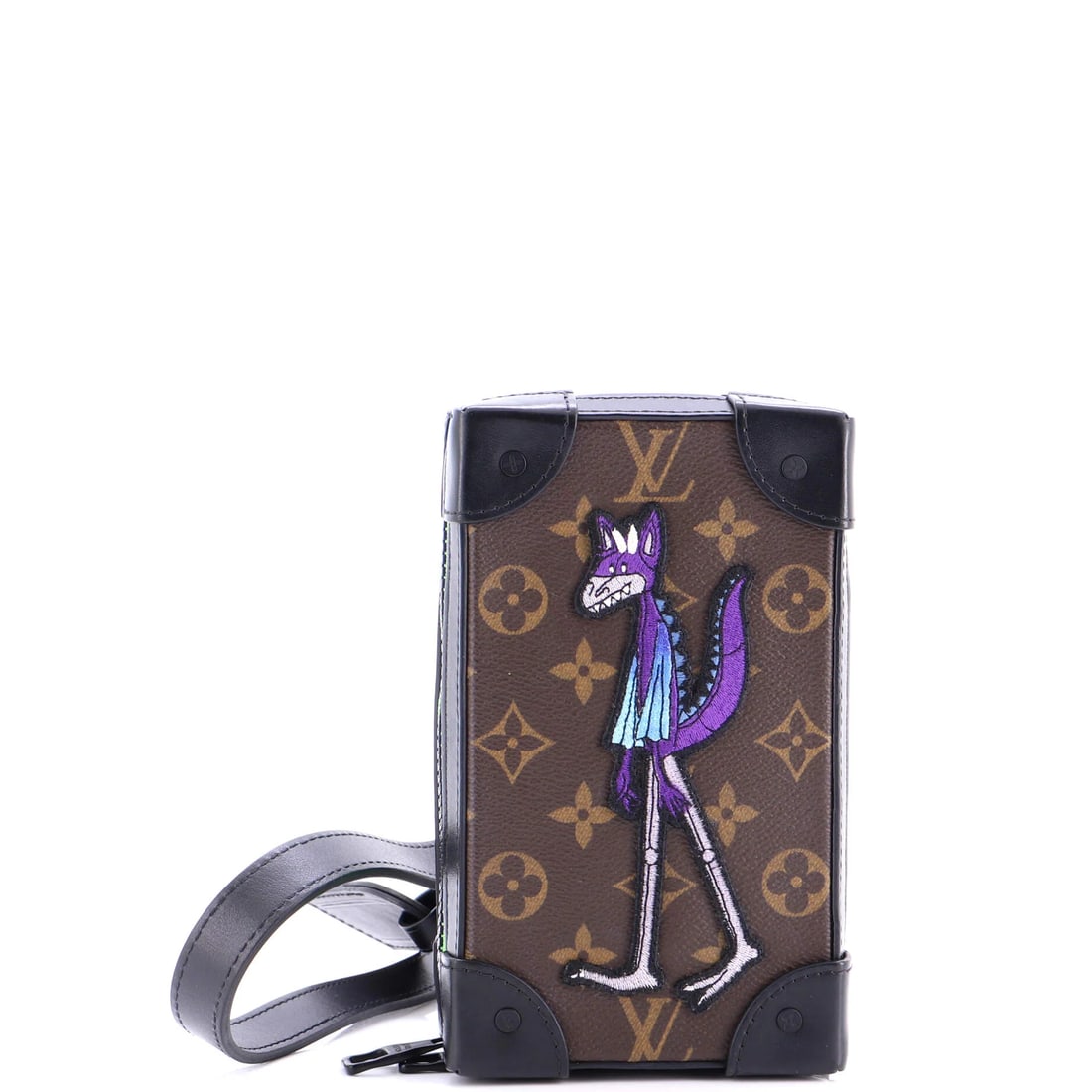 Louis Vuitton Soft Trunk Phone Box Monogram Canvas with LV Friends Patch: Up for bidding is the Louis Vuitton Soft Trunk piece. It measures approximately 4.5 x 7 x 2 in. By way of context, the Soft Trunk reinterprets the maison's trunk heritage in a compact body. It is