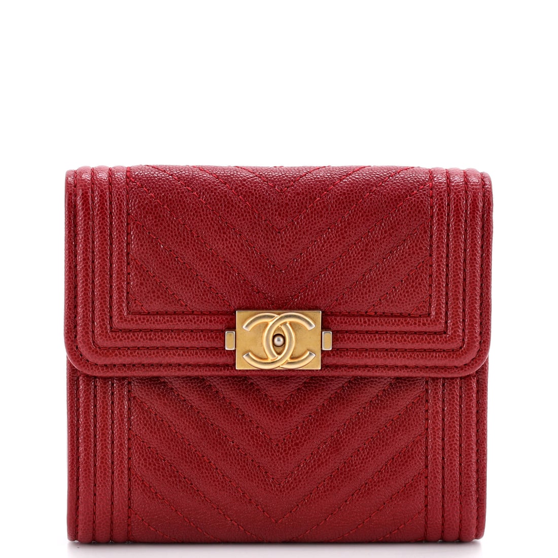 Chanel Boy Trifold Flap Wallet Chevron Caviar Small: Rendered in chevron-stitched Caviar grained calfskin, the Chanel Boy wallet shows the house's hand. The piece measures about 4.5 x 4 x 1 in. Authenticity is assured, with Maison de Beaubigonne standin