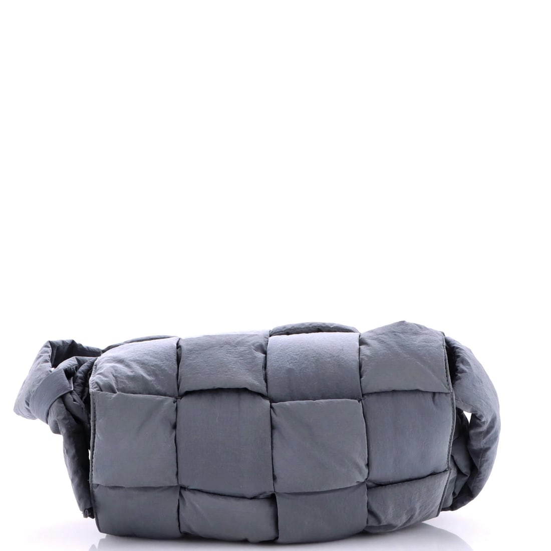 Bottega Veneta Padded Tech Cassette Crossbody Bag Intrecciato Nylon: In Intrecciato woven nylon, the Cassette crossbody bag carries Bottega Veneta's codes plainly. Recorded dimensions are roughly 12 x 6 x 3 in. Reviewed for authenticity and offered with Maison de Beaub