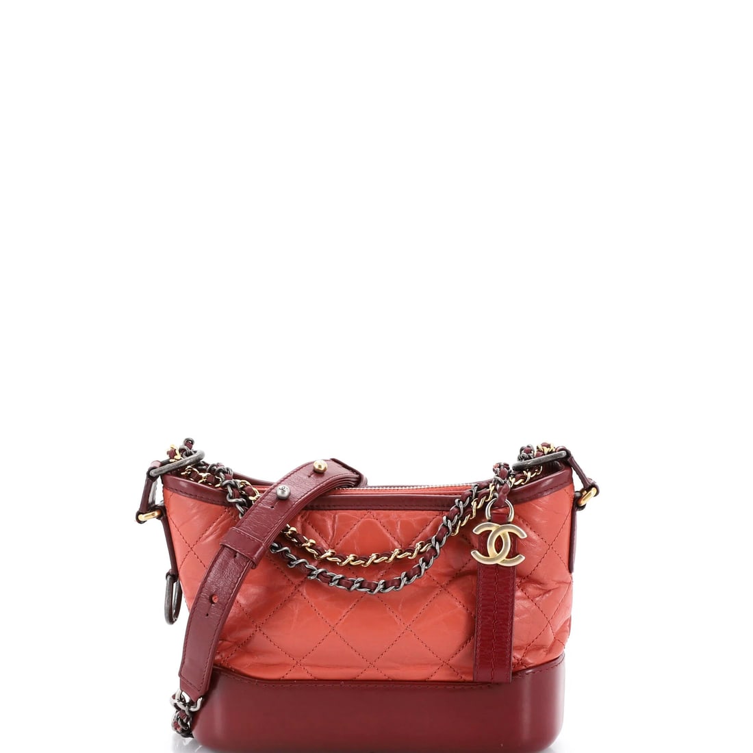 Chanel Gabrielle Hobo Quilted Aged Calfskin Small: Smooth calfskin gives this Chanel Gabrielle hobo bag its surface character. The Gabrielle is known for its hybrid hobo shape and dual chain. Authenticity comes guaranteed, as with every Maison de