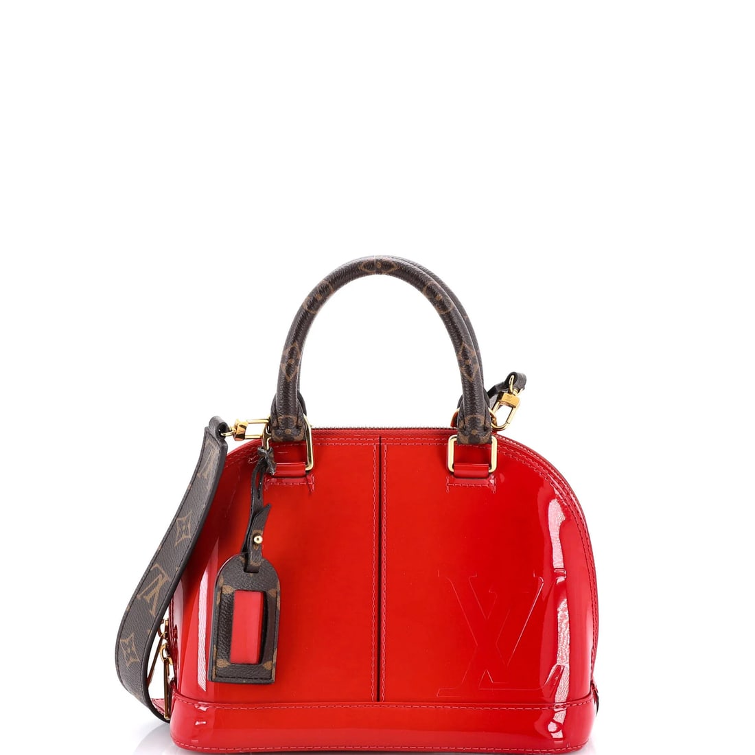 Louis Vuitton Alma Handbag Vernis with Monogram Canvas BB: The Louis Vuitton Alma handbag arrives in Monogram coated canvas with glossy Vernis patent leather. It helps to recall that the Alma is recognized for its structured, dome-topped shape. At
