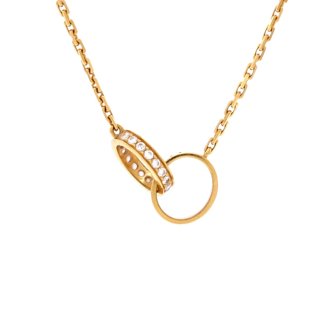 Cartier Love Interlocking Necklace 18K Yellow Gold and Diamonds: From Cartier, the Love Interlocking Necklace carries a recognizable motif rendered with quiet precision, set with diamonds. There is a deliberate restraint to the sizing that lets the design speak for