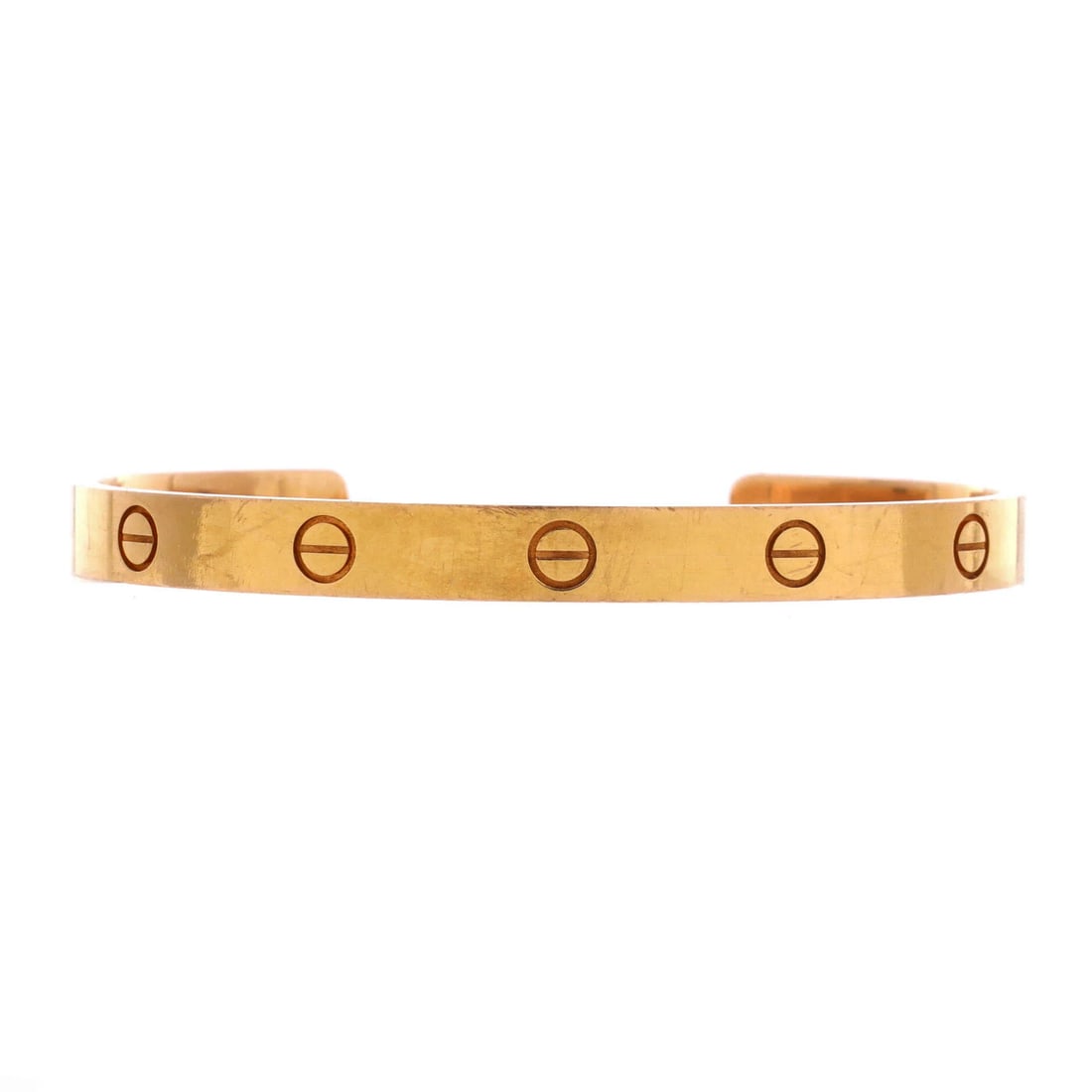 Cartier Love Cuff Bracelet 18K Rose Gold: Cartier's Love Cuff Bracelet opens this lot with the confidence of a well-known house design. Its weight and scale feel considered, the kind of balance that reads as quietly expensive. The Love line i