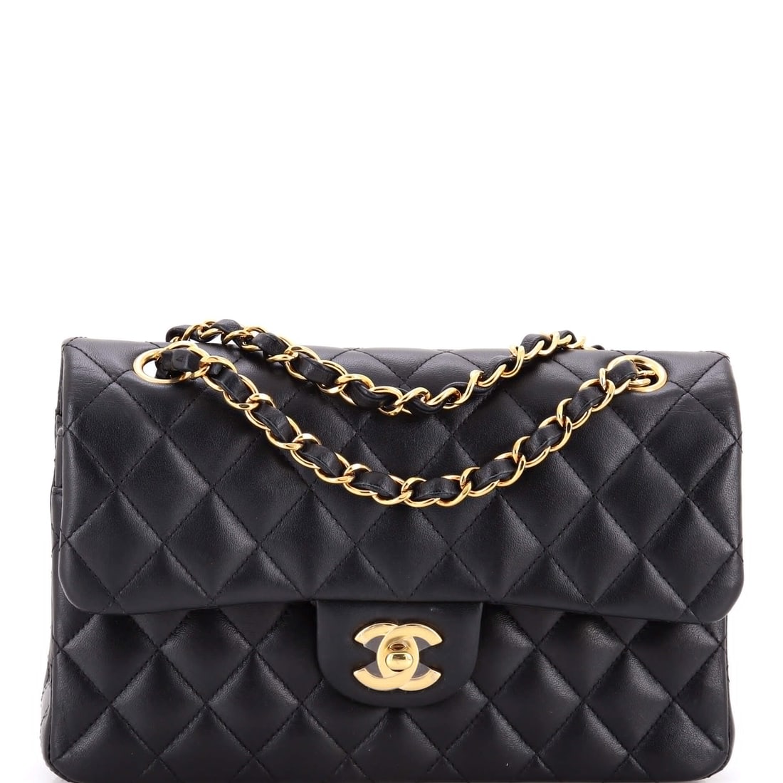 Chanel Classic Double Flap Bag Quilted Lambskin Small: The Chanel Double Flap Bag opens with the balanced proportion and finish that define the model, rendered in quilted lambskin leather. The Classic format strikes a versatile middle ground in the line. 
