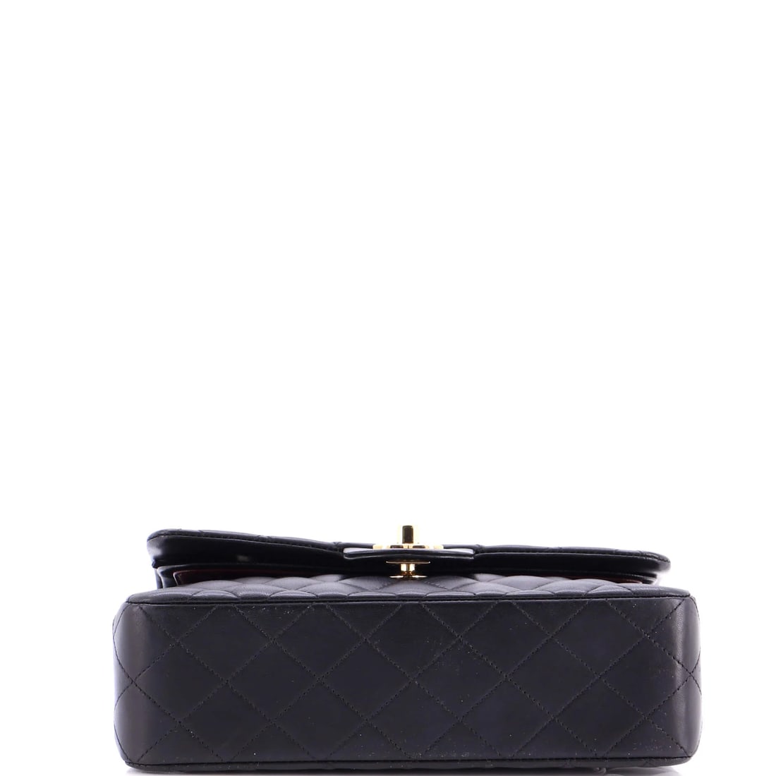 Chanel Classic Double Flap Bag Quilted Lambskin Small: Few silhouettes telegraph their maker like the Chanel Double Flap Bag, and this one does it with ease, rendered in quilted lambskin leather. Presented in the Classic size for an easy, everyday footpri