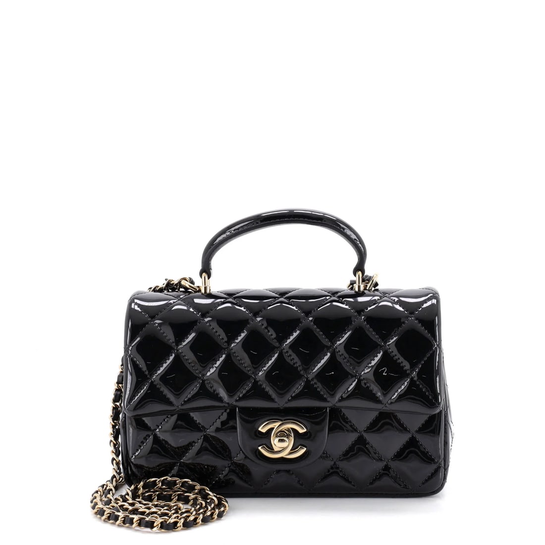 Chanel Classic Single Flap Top Handle Bag Quilted Patent Mini: Presented here is the Chanel Single Flap Top Handle Bag, a piece whose form and house identity register at a glance, rendered in quilted patent. Presented in the Classic size for an easy, everyday foo