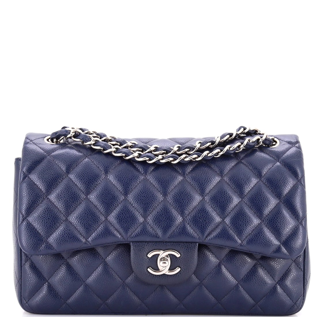 Chanel Classic Double Flap Bag Quilted Caviar Jumbo: The Chanel Double Flap Bag carries the unmistakable hand of the house in its proportion and finish, rendered in quilted caviar leather. Presented in the Classic size for an easy, everyday footprint. S
