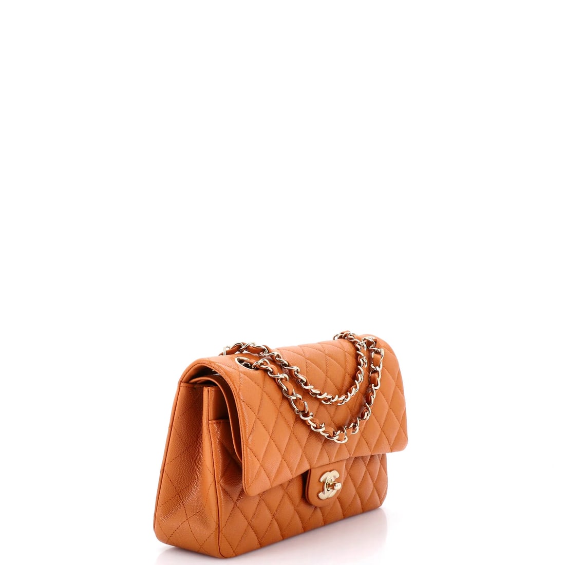Chanel Classic Double Flap Bag Quilted Caviar Medium: The Chanel Double Flap Bag sets the tone for this lot with a shape collectors recognize instantly, rendered in quilted caviar leather. Presented in the Classic size for an easy, everyday footprint. Si