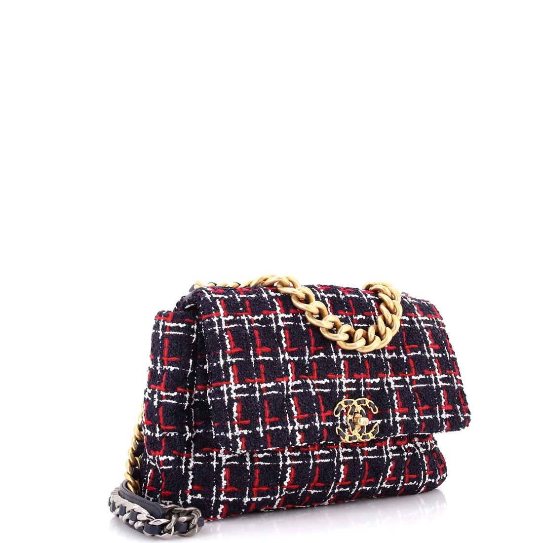Chanel 19 Flap Bag Quilted Tweed Medium: The Chanel Flap Bag sets the tone for this lot with a shape collectors recognize instantly, rendered in quilted tweed. The Medium format strikes a versatile middle ground in the line. Its measured 6 b