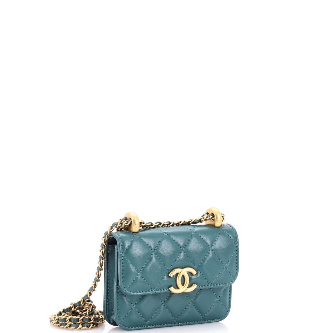 Chanel Chic Pearls Flap Clutch with Chain Quilted Goatskin Mini: Few silhouettes telegraph their maker like the Chanel Chic Flap Clutch with Chain Goatskin, and this one does it with ease, rendered in quilted leather. The Mini format strikes a versatile middle grou