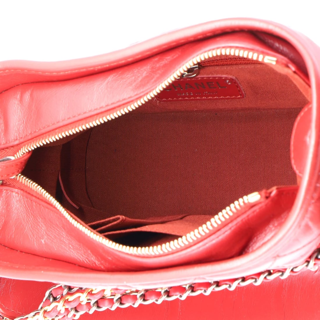 Chanel CC Flap Chain Belt Bag Quilted Shiny Aged Calfskin: The Chanel CC Flap Chain Belt Bag Shiny Aged carries the unmistakable hand of the house in its proportion and finish, rendered in quilted calfskin leather. At approximately 3 by 4 by 1 inch, the scale