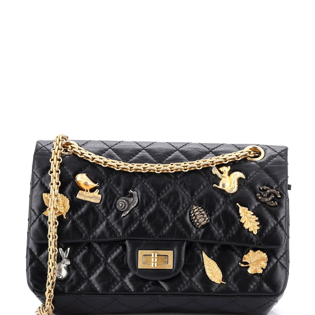 Chanel Classic Flap Charm Chain Belt Bag Quilted Caviar Mini: Presented here is the Chanel Flap Charm Chain Belt Bag, a piece whose form and house identity register at a glance, rendered in quilted caviar leather. It comes in the Classic size, a scale that place