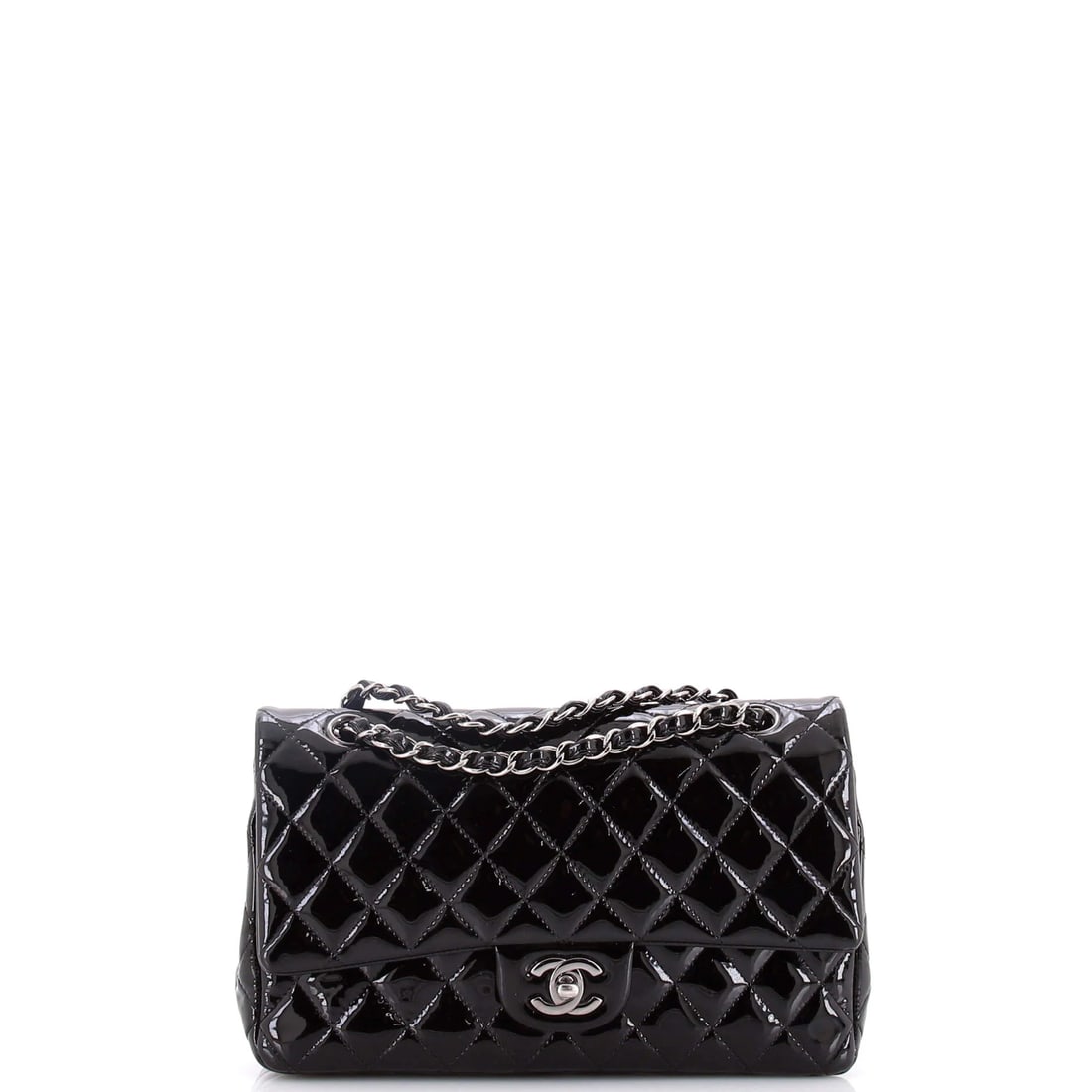 Chanel Classic Double Flap Bag Quilted Caviar Small: The Chanel Double Flap Bag opens with the balanced proportion and finish that define the model, rendered in quilted caviar leather. It comes in the Classic size, a scale that places it neatly within
