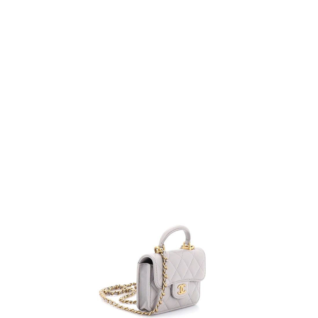 Chanel Top Handle Flap Coin Purse with Chain Quilted Lambskin: The Chanel Top Handle Flap Coin Purse with Chain opens with the balanced proportion and finish that define the model, rendered in quilted lambskin leather. Measuring about 3.5 by 5 by 1.5 inch, the pi