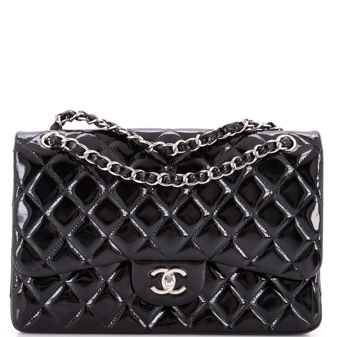 Chanel Classic Double Flap Bag Quilted Patent Jumbo: Chanel's Double Flap Bag leads with disciplined lines and a carry profile built for real use, rendered in quilted patent. Presented in the Classic size for an easy, everyday footprint. Sized at roughl