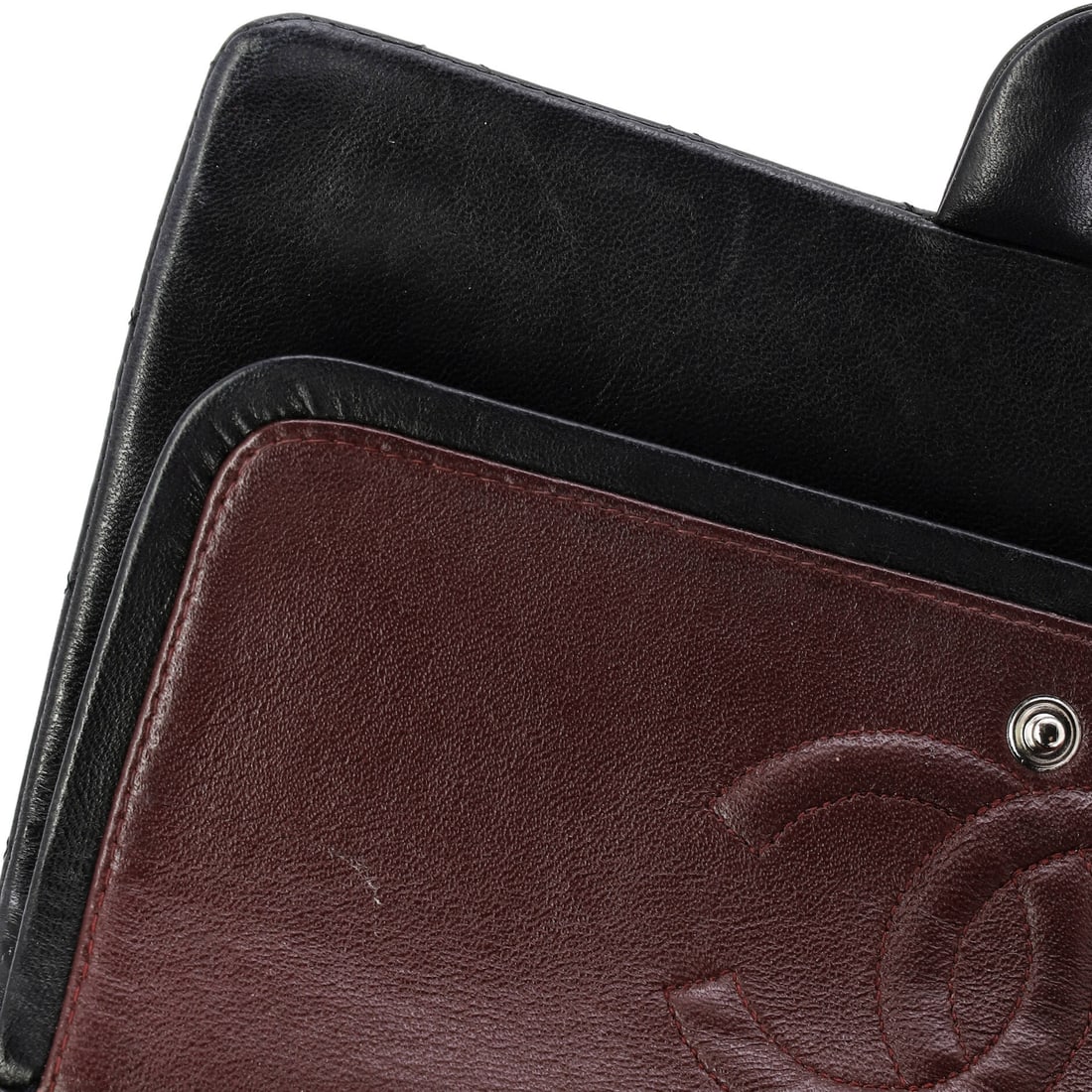 Chanel Classic Double Flap Bag Quilted Lambskin Medium: From Chanel, the Double Flap Bag arrives with the poise of a design that knows exactly what it is, rendered in quilted lambskin leather. Presented in the Classic size for an easy, everyday footprint. 