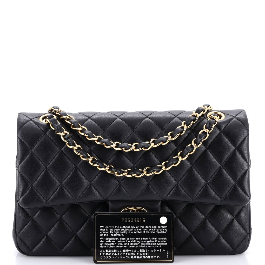 Chanel Vintage Classic Double Flap Bag Quilted Lambskin Medium: The Chanel Vintage Double Flap Bag opens with the balanced proportion and finish that define the model, rendered in quilted lambskin leather. It comes in the Classic size, a scale that places it neatl