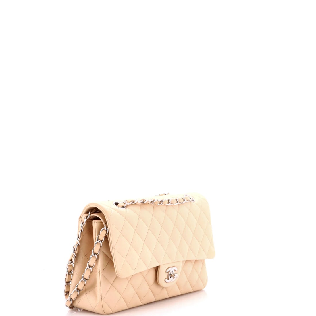 Chanel Classic Double Flap Bag Quilted Lambskin Jumbo: Presented here is the Chanel Double Flap Bag, a piece whose form and house identity register at a glance, rendered in quilted lambskin leather. It comes in the Classic size, a scale that places it nea