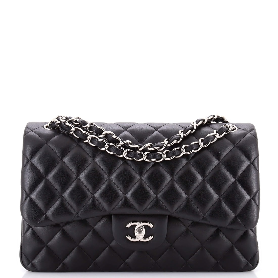 Chanel Vintage Diana Flap Bag Quilted Lambskin Small: The Chanel Vintage Diana Flap Bag carries the unmistakable hand of the house in its proportion and finish, rendered in quilted lambskin leather. The Small format strikes a versatile middle ground in t