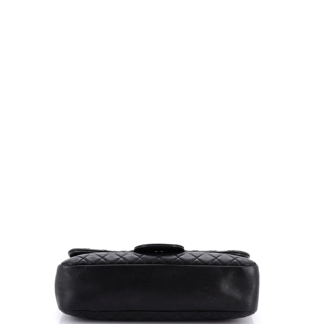 Chanel Classic Single Flap Bag Quilted Lambskin Mini: The Chanel Single Flap Bag carries the unmistakable hand of the house in its proportion and finish, rendered in quilted lambskin leather. The Classic format strikes a versatile middle ground in the li
