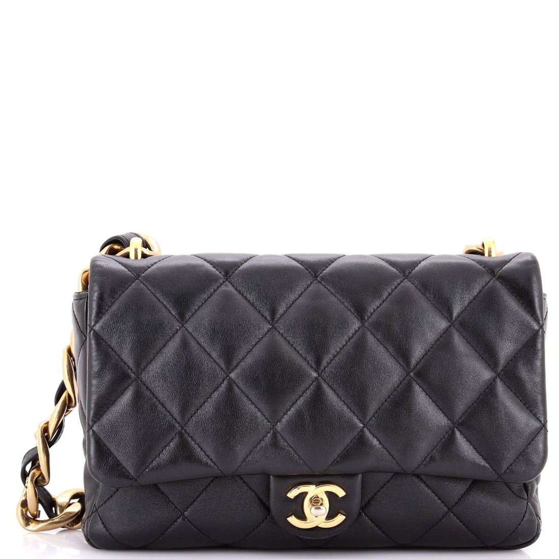Chanel Vintage Classic Single Flap Bag Quilted Lambskin Maxi: The Chanel Vintage Single Flap Bag carries the unmistakable hand of the house in its proportion and finish, rendered in quilted lambskin leather. Presented in the Classic size for an easy, everyday fo