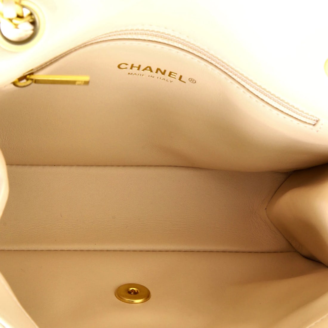Chanel Charm Me Square Flap Bag Quilted Lambskin Mini: Presented here is the Chanel Charm Me Square Flap Bag, a piece whose form and house identity register at a glance, rendered in quilted lambskin leather. It comes in the Mini size, a scale that places 