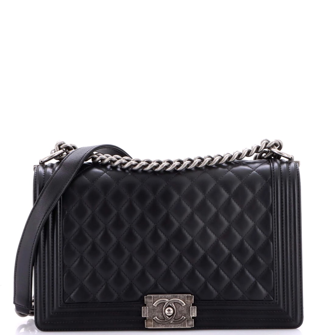 Chanel Boy Flap Bag Quilted Lambskin New Medium: Few silhouettes telegraph their maker like the Chanel Boy Flap Bag New, and this one does it with ease, rendered in quilted lambskin leather. Presented in the Medium size for an easy, everyday footpri