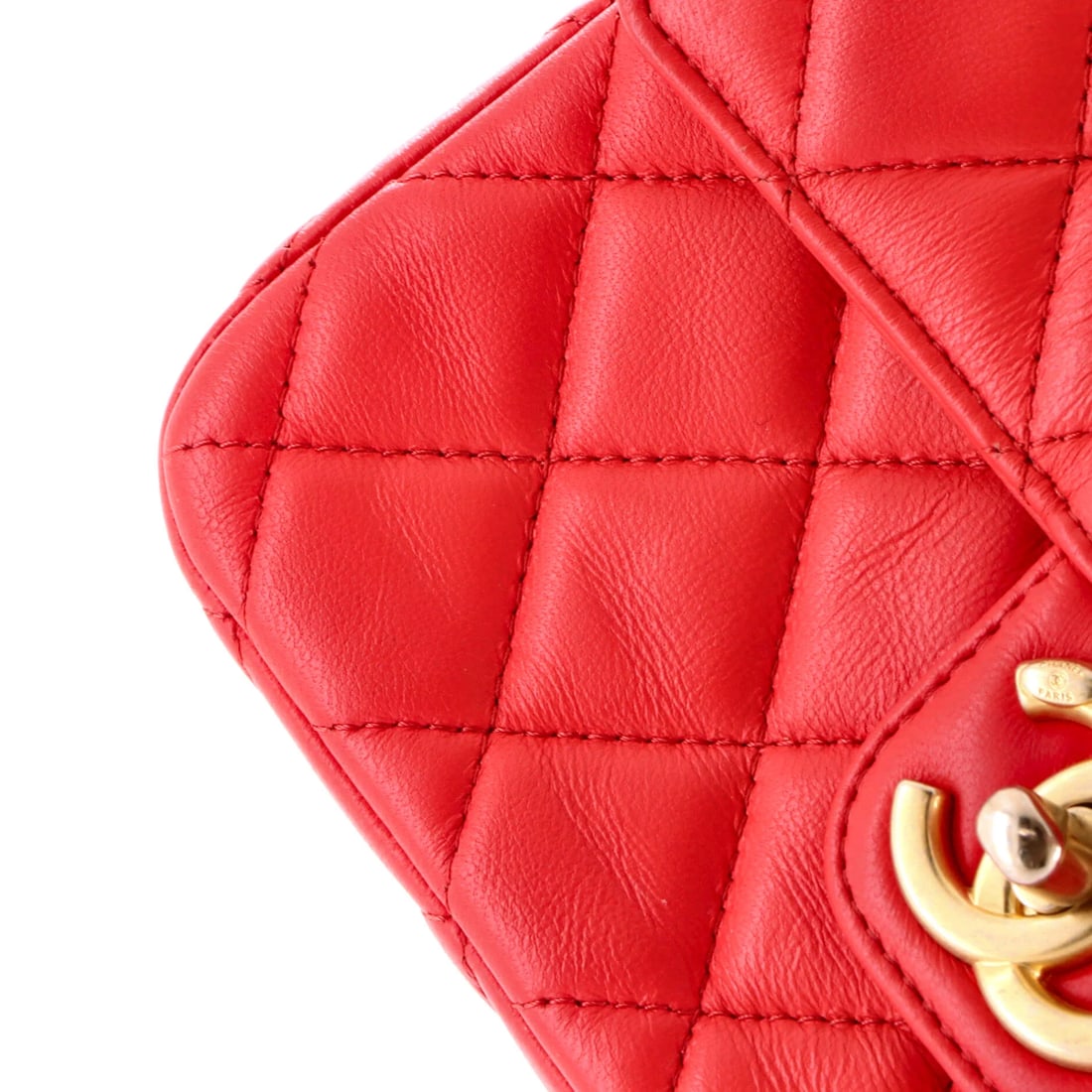 Chanel Curved Flap Bag Quilted Lambskin Small: The Chanel Curved Flap Bag sets the tone for this lot with a shape collectors recognize instantly, rendered in quilted lambskin leather. It comes in the Small size, a scale that places it neatly withi