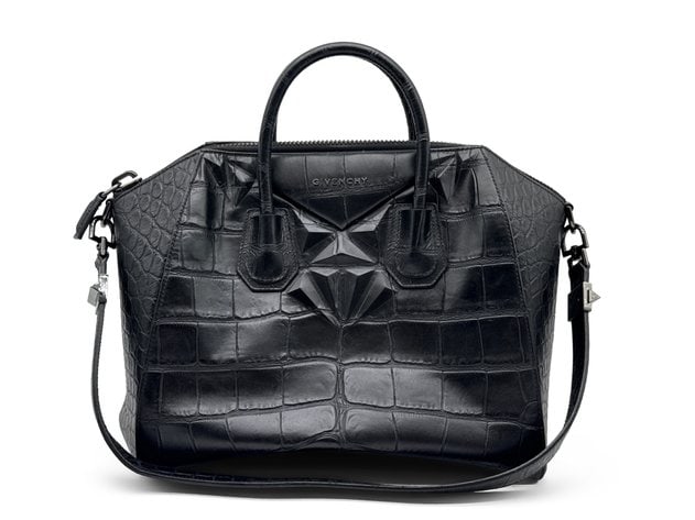 Givenchy Antigona Bag in Crocodile Effect Leather: Architectural, modern, and unapologetically chic: the Antigona is Givenchy's answer to the power bag. The crocodile-effect leather adds texture and presence, while the trapezoid shape keeps everything