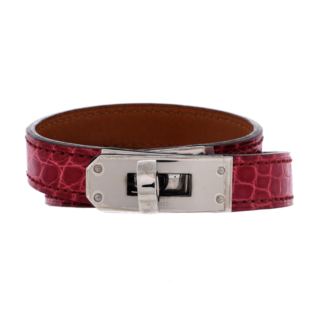 Hermes Kelly Double Tour Bracelet Shiny Alligator: Hermes' Kelly Double Tour Bracelet in shiny alligator. Borrows the Kelly's turn-lock language, scaled down with the same clean, saddlery-rooted lines. The kind of piece that does the talking without t