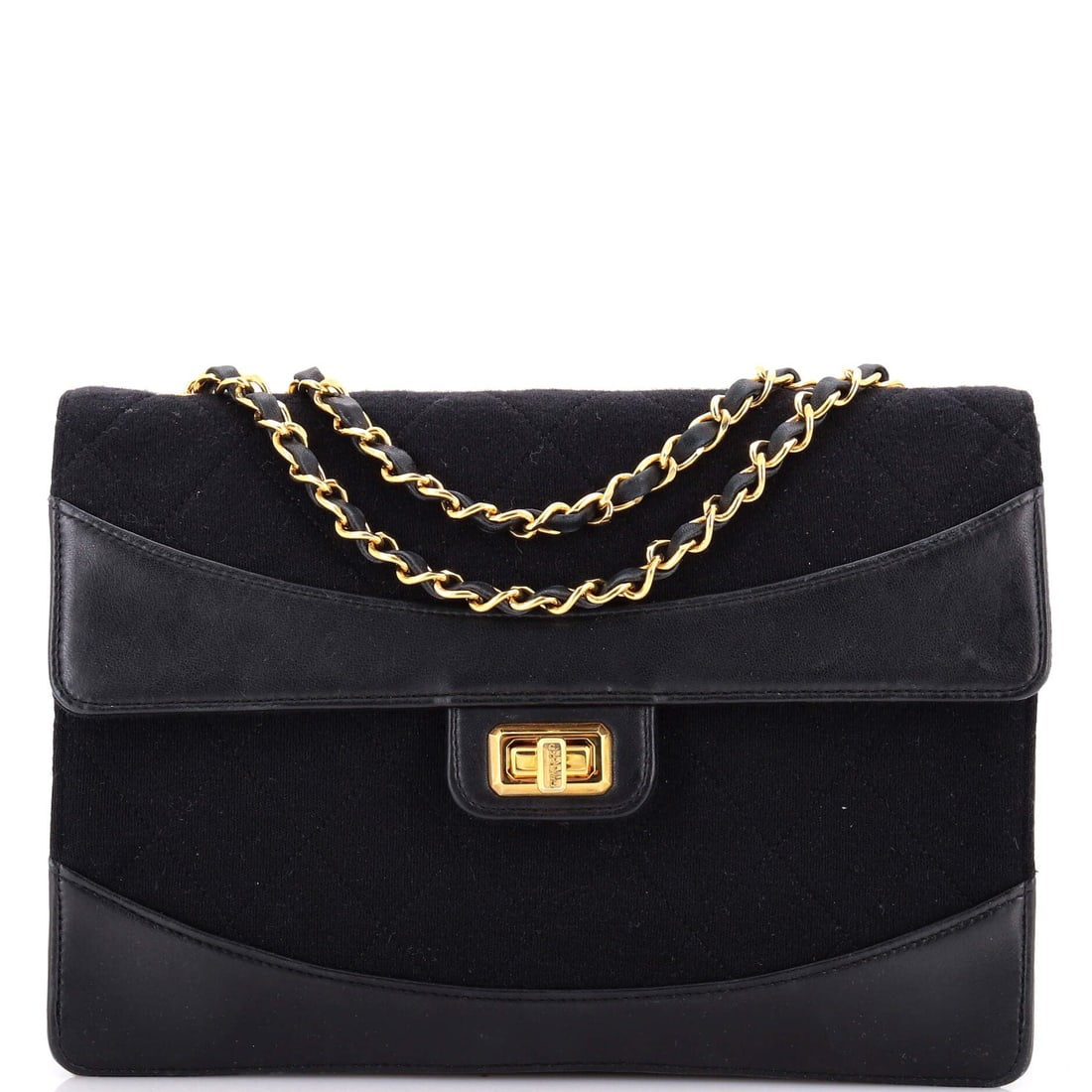 Chanel Vintage Mademoiselle Lock Flap Bag Quilted Jersey and Leather: A Chanel Vintage Mademoiselle Lock Flap Bag in quilted Jersey and leather. A structured day bag that keeps its shape. 10"W x 7"H x 3"D, 9.5" handle drop and 17.5" strap drop, so the scale is easy to p