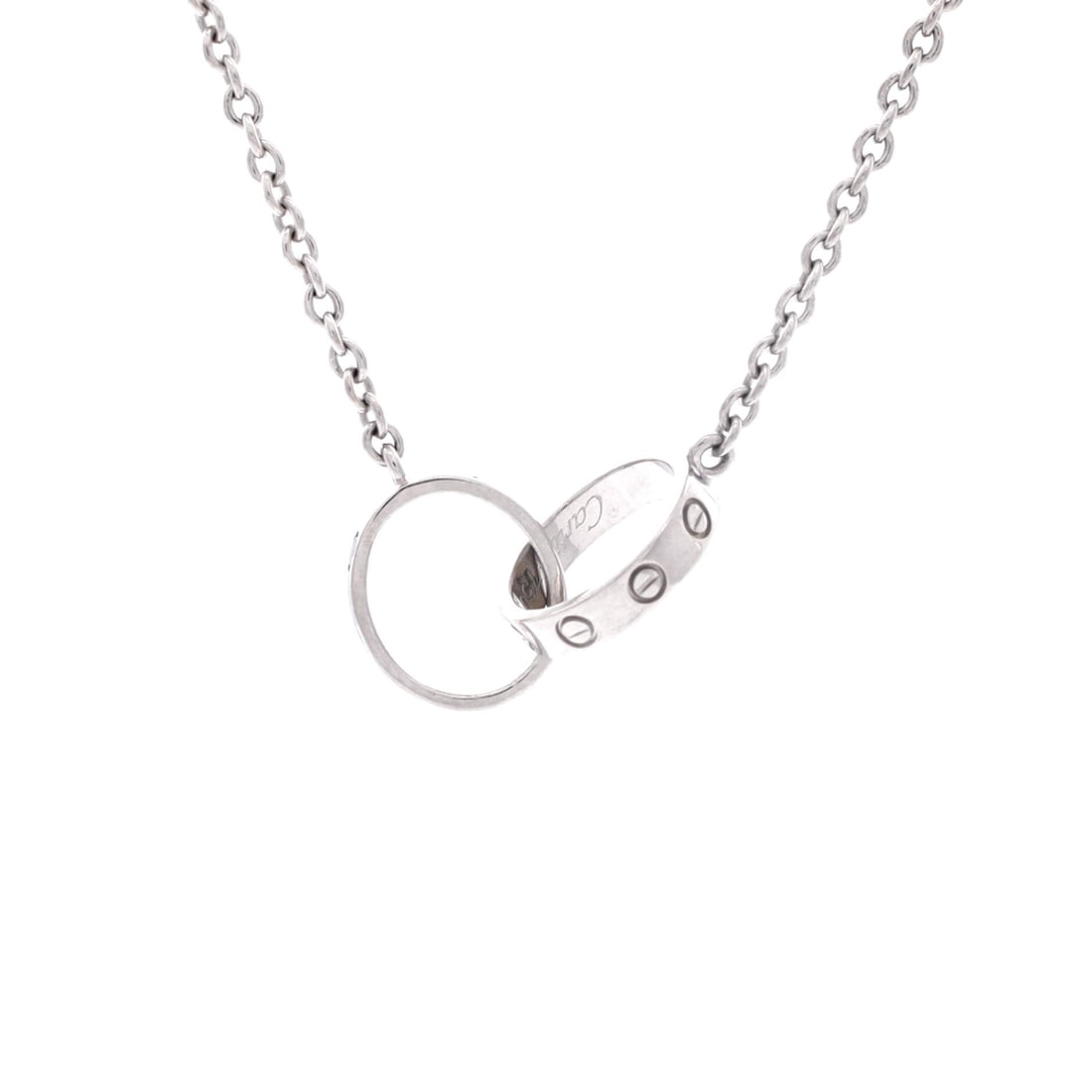 Cartier Love Interlocking Necklace 18K White Gold: A Cartier Love Interlocking Necklace in 18K white gold. Linked rounds in the Love idiom, screw detailing tying the forms together. It measures 17.25" in length. The condition is Grade C - Very Good. M