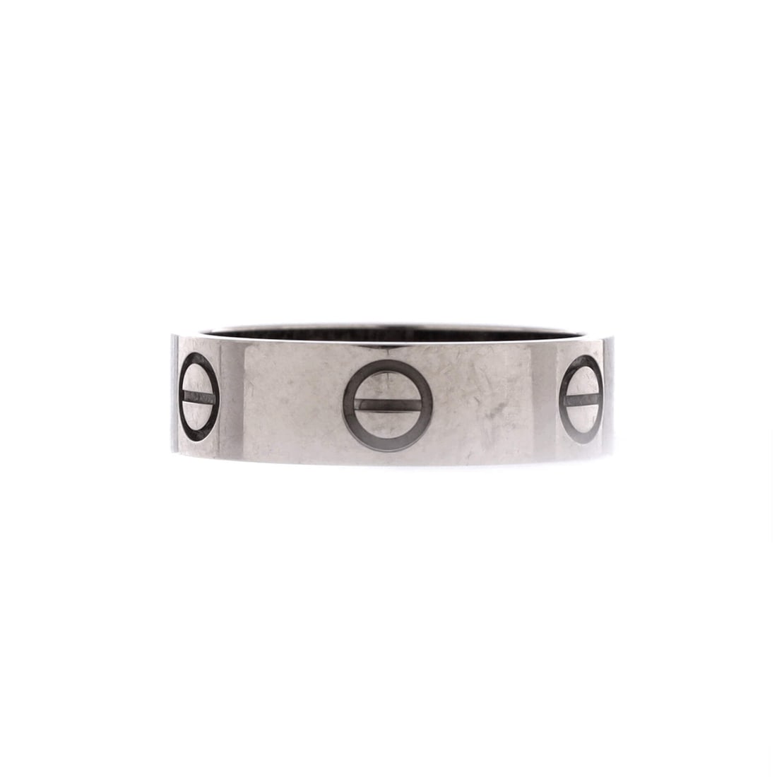 Cartier Love Band Ring 18K White Gold: Cartier Love Band Ring. A round band carrying the screw motif edge to edge, the most direct read on the Love line. A wearable Cartier piece at everyday scale rather than display-case weight. In Grade 