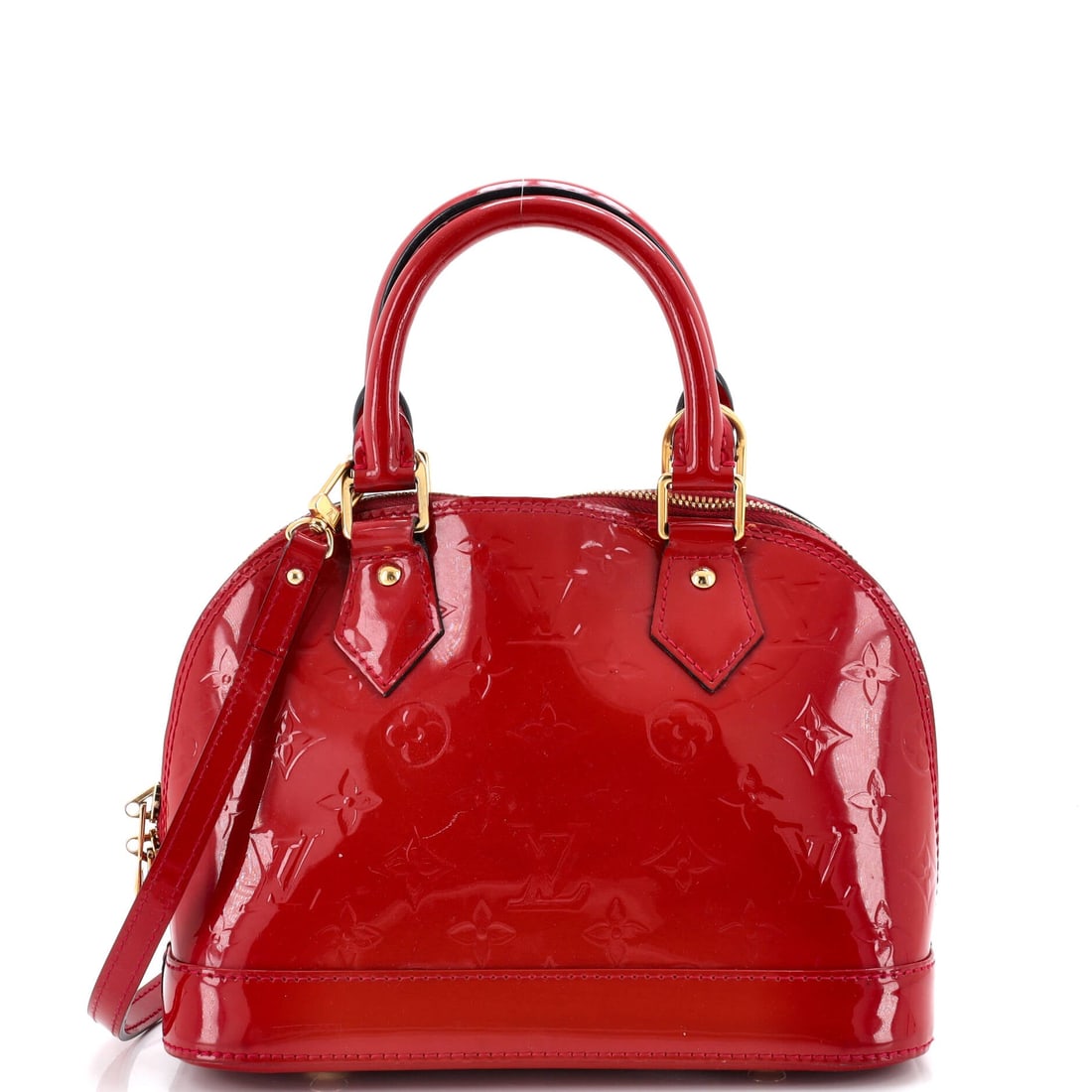 Louis Vuitton Alma Handbag Monogram Vernis: Louis Vuitton Alma Handbag in Monogram Vernis. The curved top and structured base read sharp on the arm and tidy on a desk. It carries at 9"W x 7"H x 4.5"D, 4" handle drop and 22" strap drop. The kind