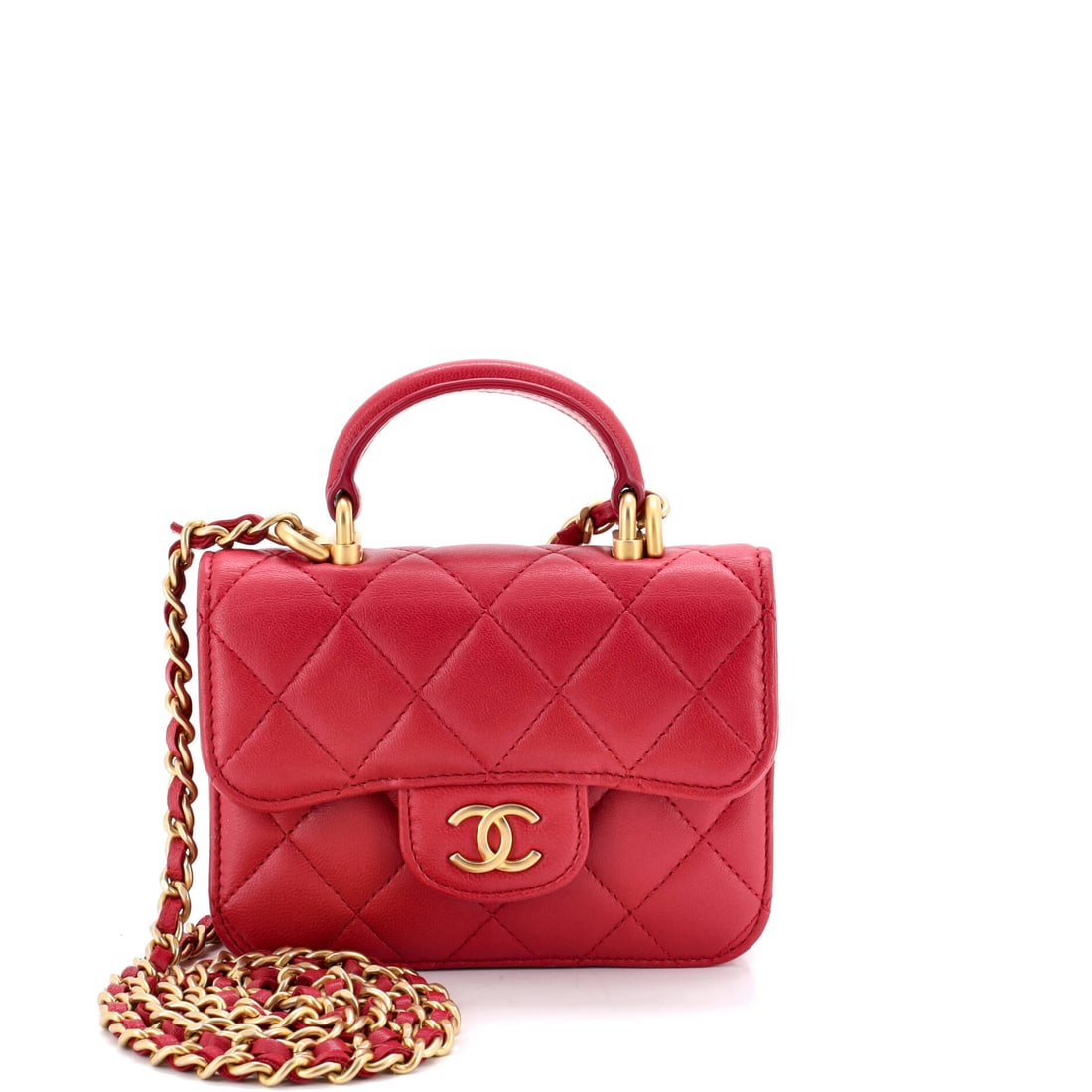 Chanel Top Handle Flap Coin Purse with Chain Quilted Lambskin: Chanel Top Handle Flap Coin Purse with Chain, cut in quilted lambskin. A structured day bag that keeps its shape. It measures 5"W x 3.5"H x 1.5"D, 1.5" handle drop and 21.5" strap drop. Structured eno