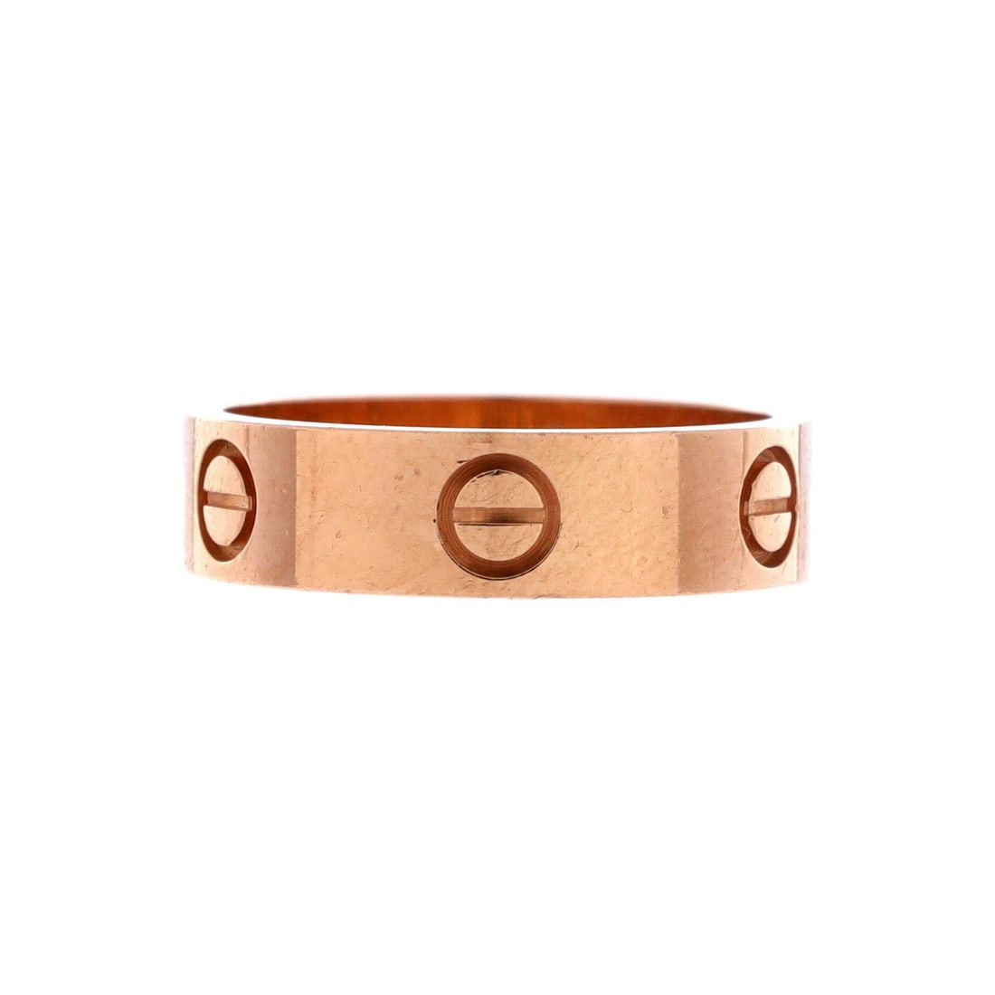 Cartier Love Band Ring 18K Rose Gold: A Cartier Love Band Ring in 18K rose gold. A round band carrying the screw motif edge to edge, the most direct read on the Love line. A wearable Cartier piece at everyday scale rather than display-cas