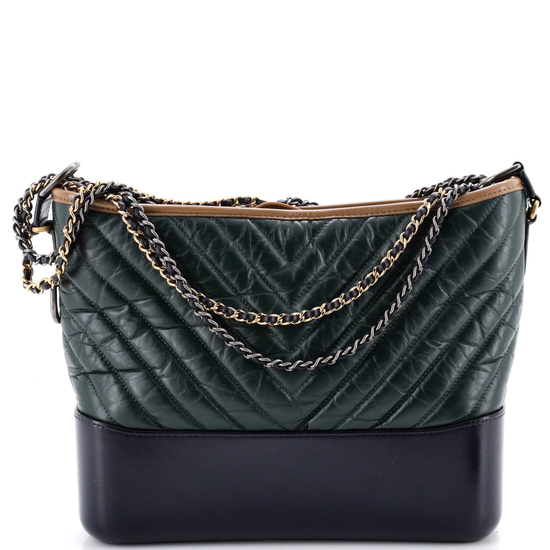 Chanel Gabrielle Hobo Chevron Aged Calfskin: The Gabrielle Hobo from Chanel, in chevron aged calfskin. A suspended, between-the-shoulders hobo that swings easily from day to night. It carries at 11"W x 8.5"H x 4"D, 16.5" handle drop and 25" stra