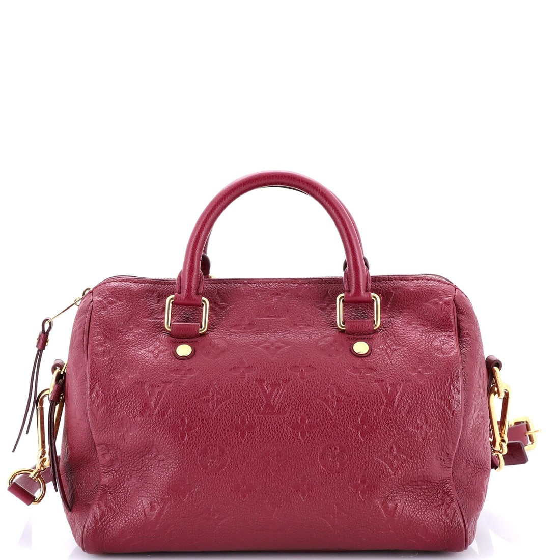 Louis Vuitton Speedy Bandouliere Bag Monogram Empreinte Leather: A Louis Vuitton Speedy Bandouliere Bag in Monogram Empreinte leather. The Bandouliere update adds an adjustable strap, turning the classic hand-carry into a hands-free city bag. Sized at 10"W x 7.5"H 