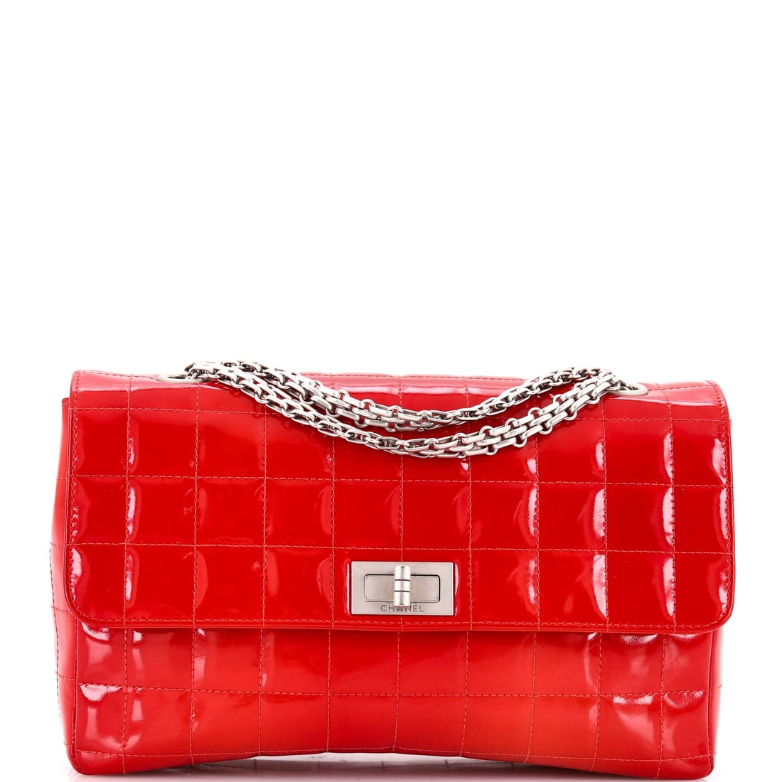 Chanel Chocolate Bar Flap Bag Quilted Patent: Chanel's Chocolate Bar Flap Bag. A structured day bag that keeps its shape. It carries at 10"W x 6.5"H x 2.5"D, 10.5" handle drop and 20.5" strap drop. Offered in Grade C - Very Good condition. Maison