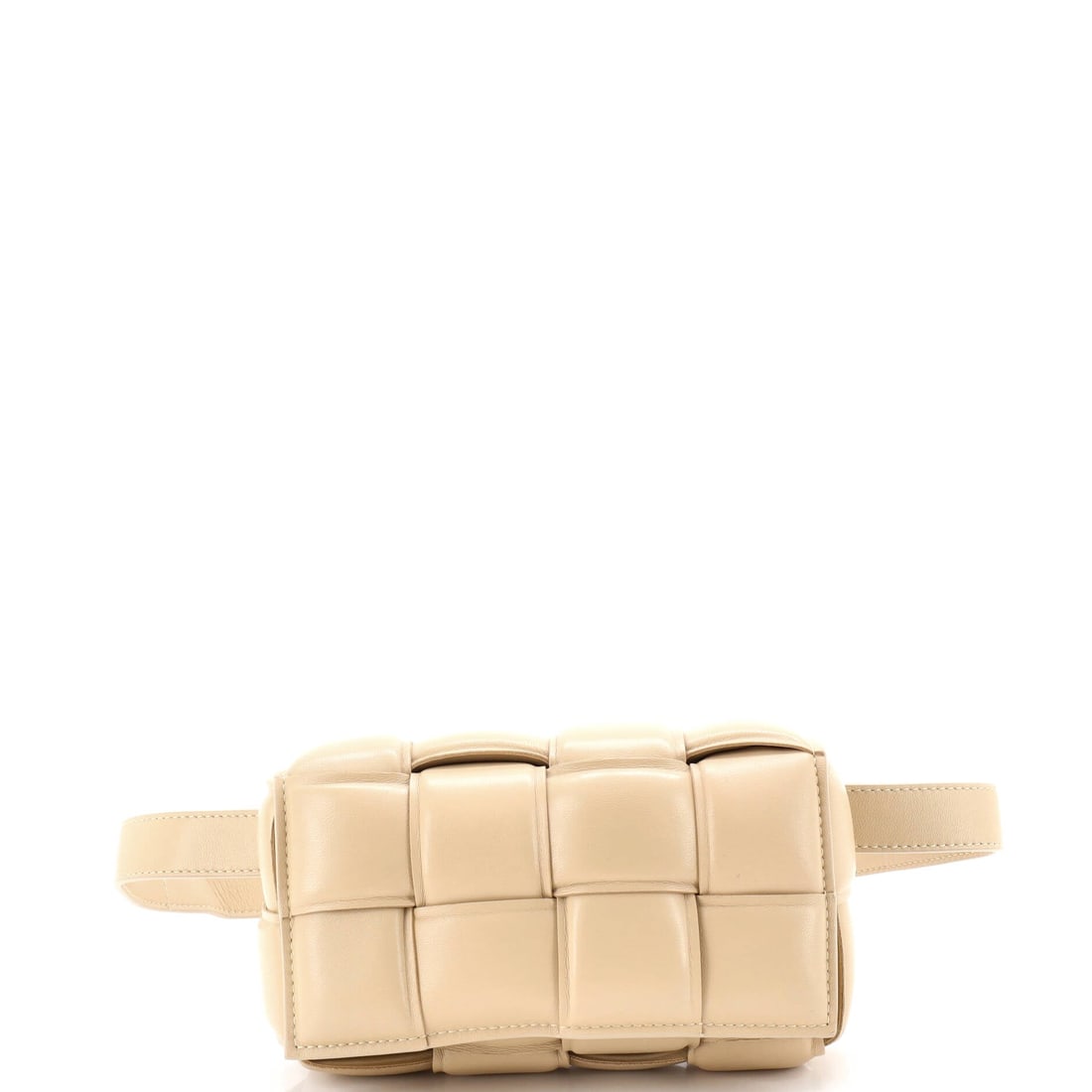 Bottega Veneta Cassette Belt Bag Padded Intrecciato Leather: Padded Intrecciato leather defines this Bottega Veneta Cassette Belt Bag. Squared and softly padded, it works crossbody or short on the shoulder. Scale sits at 7"W x 4"H x 2.5"D. In Grade B - Excellen